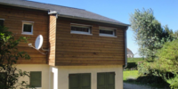 Réalisation d'une ITE, Isolation Thermique Extérieure, pose d'un bardage clin bois
