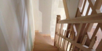 Réalisation sur mesure d'un escalier plein en bois tournant & isolation par l'intérieur ITI