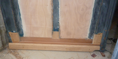 Réparation bas de porte de porche d'entrée - Seine Maritime