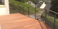 Réalisation d'une terrasse en  et garde corps en acier peint de couleur gris anthracite